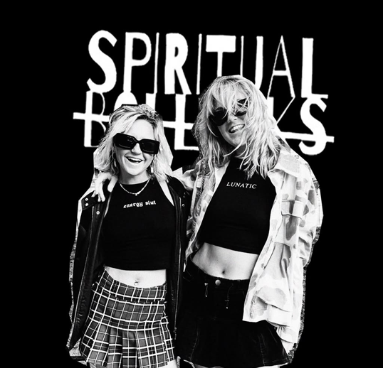 Empowered individual wearing Spiritual Bollocks clothing, embracing their authentic self.
