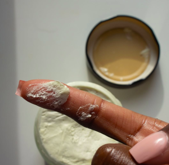 A wellness practitioner using Louis Noir butter